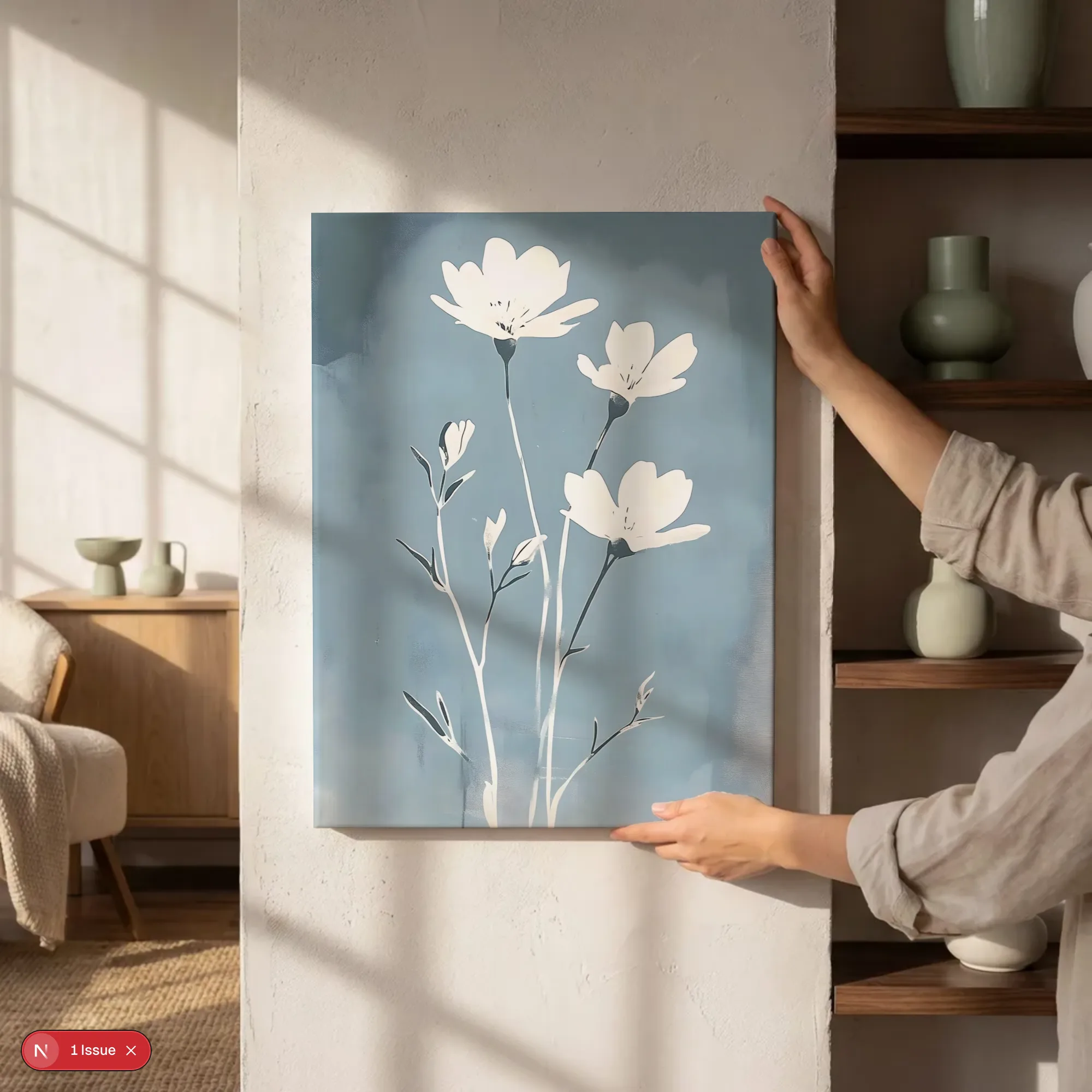 Canvas schilderij aan de muur naast een kast